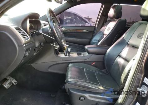 2014 Jeep Grand Cherokee Overland из США, поврежденный, VIN 1C4RJECT4EC201722